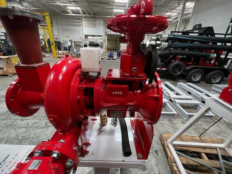 APHH high head auto-prime pump casing and prime tank assembly in AMCO red