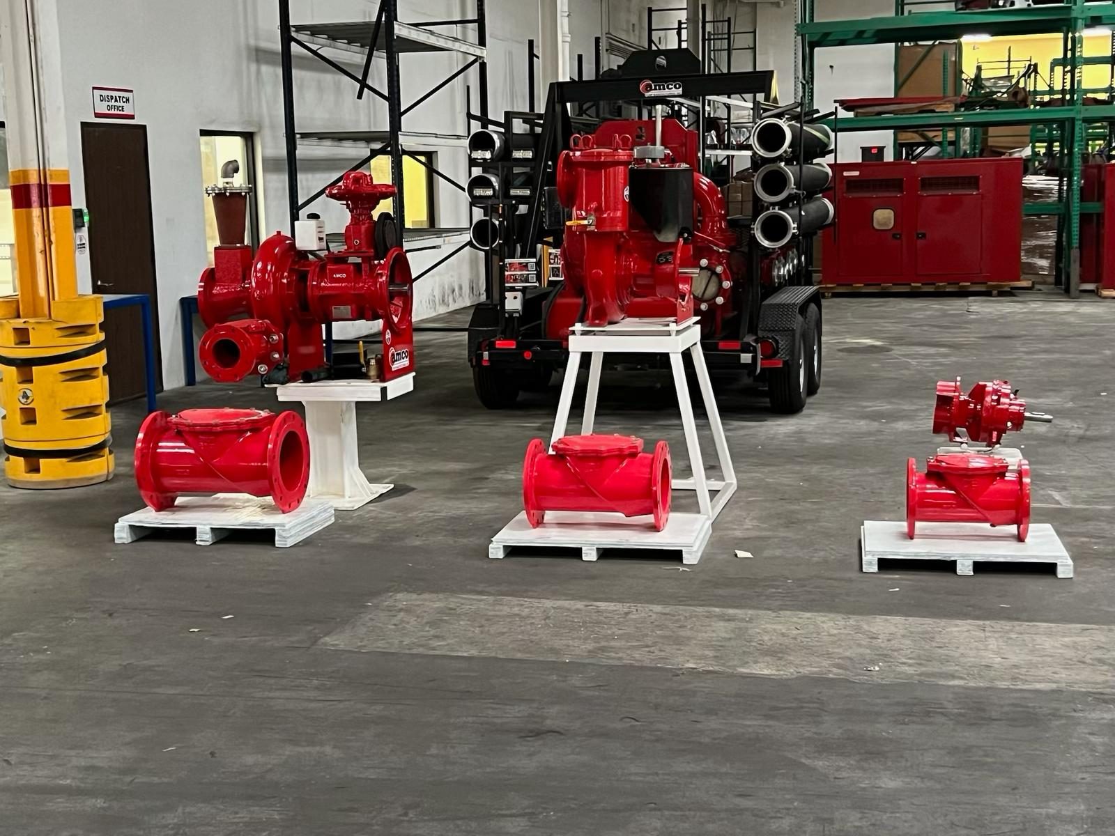 AMCO Houston manufacturing floor with pump ends and diesel-driven units staged for assembly