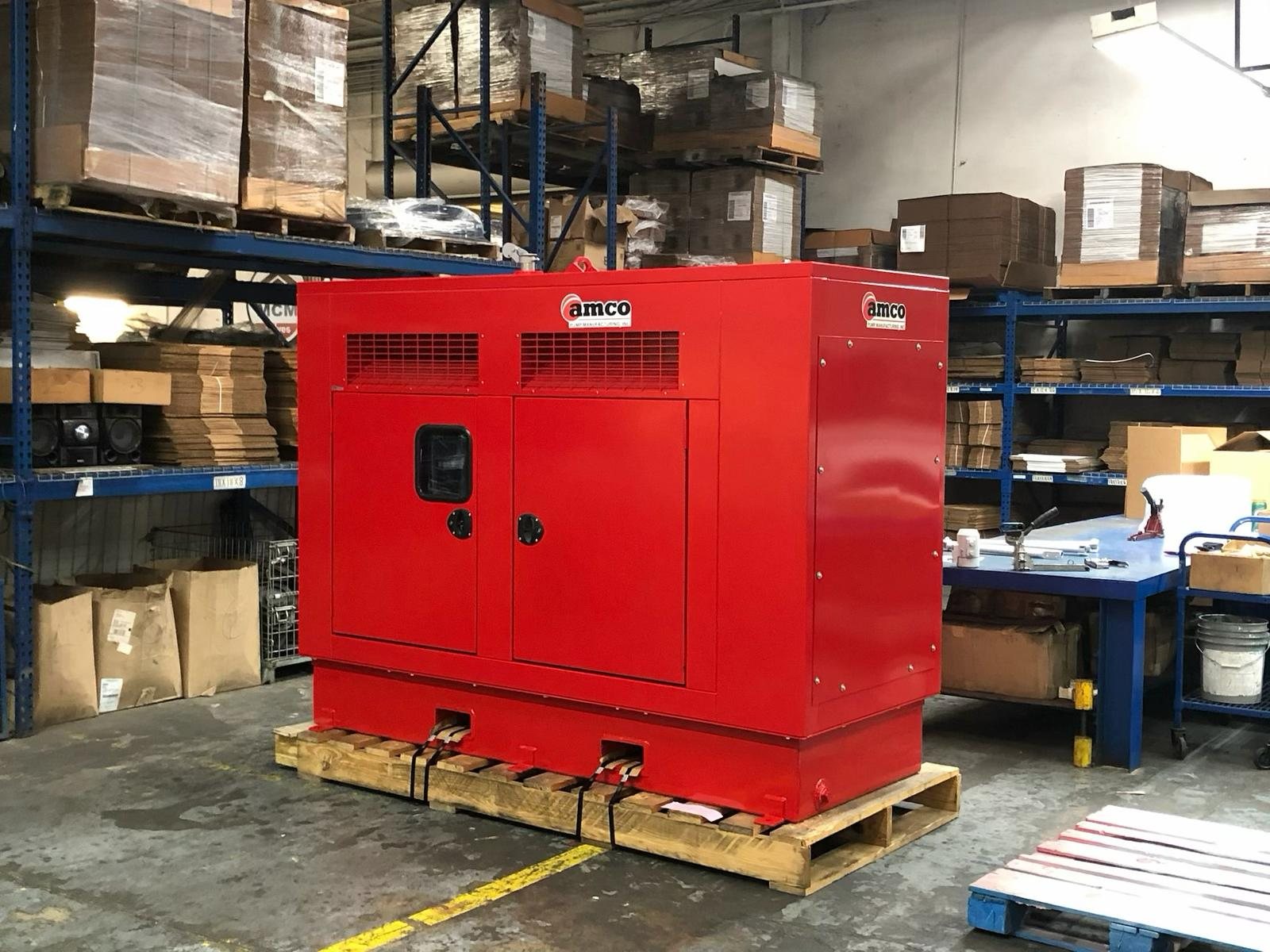Skid-mounted AMCO sound-attenuated pump unit with removable acoustic panels
